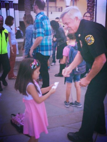 Chief Handing Out Stickers
